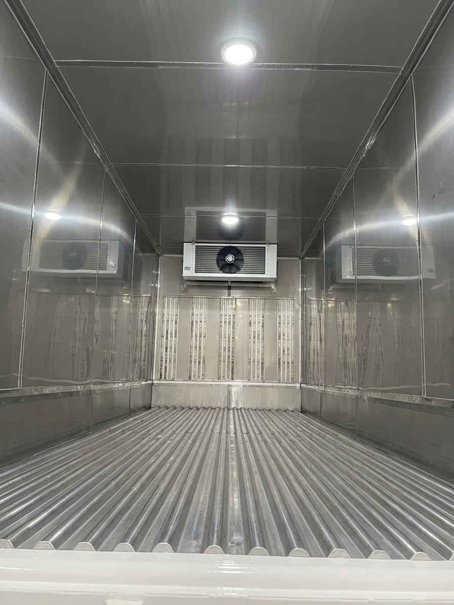 Insulated steel interior of a refrigerated truck body